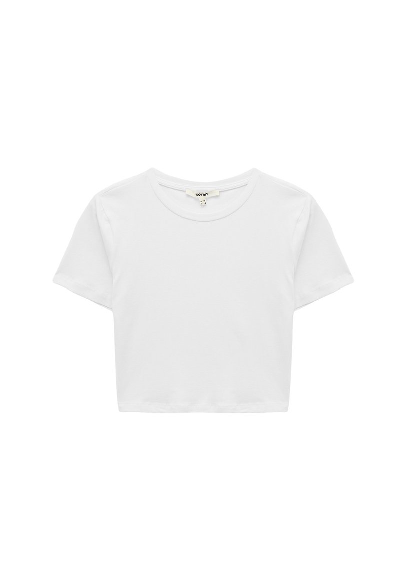 Hvid cropped t-shirt lavet af blødt bomuld. Har en rund hals og korte ærmer, med et enkelt, uprydet design.