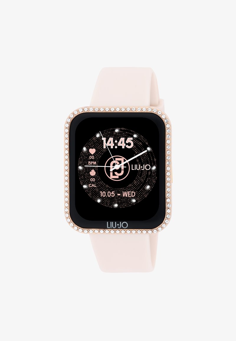 Reloj inteligente cuadrado con correa de silicona rosa, pantalla táctil negra y un bisel adornado con cristales transparentes. Muestra la hora y métricas de salud.