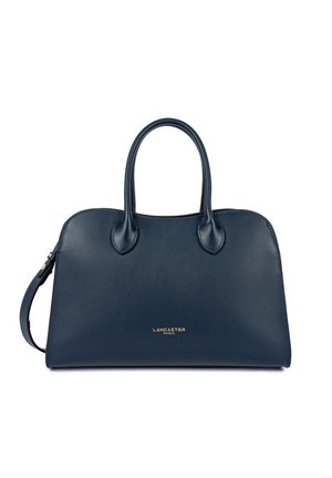 Sac à main en cuir bleu marine avec double poignées, bandoulière amovible et logo doré "Lancaster Paris" centré sur le devant.