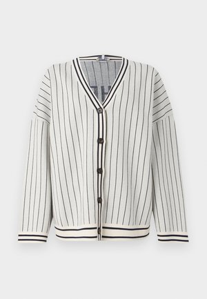 White cardigan with navy vertical stripes, v-neck, long sleeves, and five button closures. Ribbed cuffs and hem add texture.