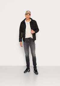 Diesel SLEENKER - Calças de ganga de corte skinny - 0eiag 02