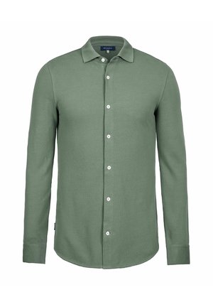 Chemise verte à manches longues en tissu texturé. Dispose d'un devant à boutons, d'un col classique et de boutons blancs.
