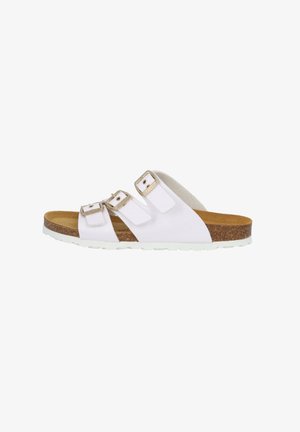 White sandal with three adjustable straps, cork midsole, and a textured rubber outsole. Features metal accents on straps for added detail.