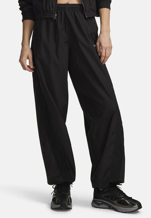 Under Armour, ICON WOVEN - Trousers - ultimate black