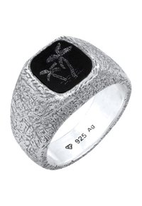 Bague en argent texturé avec une pierre carrée noire gravée de palmiers, marquée "925 Ag" à l'intérieur de l'anneau.