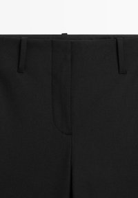 Black tailored trousers with a smooth texture, featuring a flat front, belt loops, and two side pockets for a structured appearance.