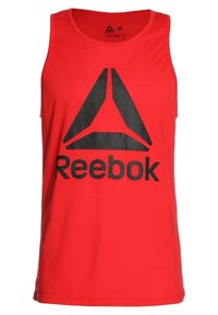 Débardeur en coton rouge avec un grand logo Reebok noir au centre, col rond et sans manches.