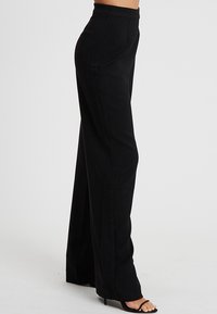TUSSAH MILLY  - Nohavice - black
