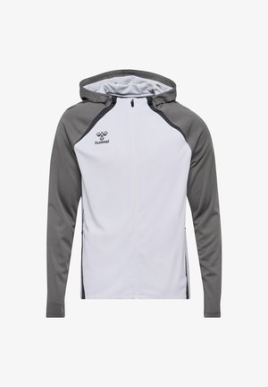 Capuchonjack met een witte romp en grijze raglanmouwen, voorzien van een volledige rits, zijzakken en zwarte accenten bij de rits.