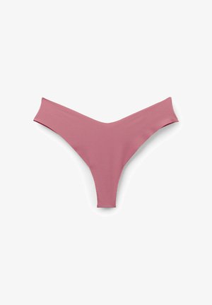 Culotte string pour femmes rose, sans couture, avec une ceinture en forme de V, posée à plat sur un fond blanc.