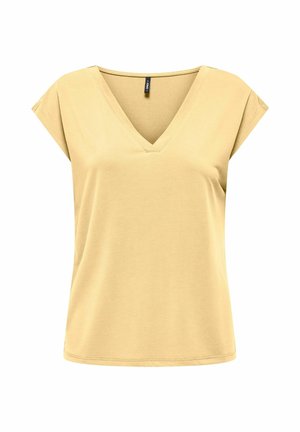 Jasnożółta damska bluzka z krótkim rękawem i dekoltem w serek, o prostym, luźnym kroju, z małą czarną metką marki w środku przy dekolcie.