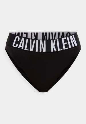 Melnas bikini apakšdaļas ar platu melnu jostasvietu, priekšpusē izcili balti uzraksti "Calvin Klein".