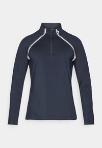 Pullover azul-marinho de manga longa com colarinho de meio zíper, apresentando riscas brancas nos ombros e uma textura de tecido suave e leve.