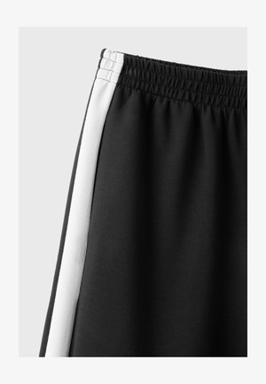 Stradivarius, SOFT-TOUCH WIDE-LEG JOGGER TROUSERS WITH SIDE BAND - Tepláky - black