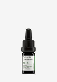 Bottiglia contagocce in vetro nero con coperchio nero, etichetta verde e bianca con dettagli sul prodotto e un tappo a contagocce per il dosaggio.