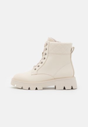 Bottines à plateau - off-white