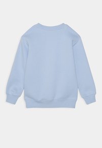 Champion CREW NECK UNISEX - Sweatshirt - light blue