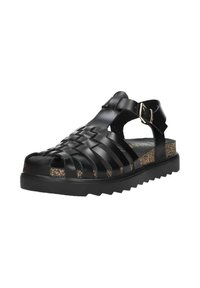Black woven sandals with a textured cork midsole and a ridged rubber outsole. Features a buckled strap for secure fit.