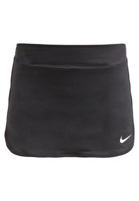 Skort atlético negro hecho de un material suave y elástico. Presenta una cintura plana y un logo de Nike blanco en la parte inferior derecha.