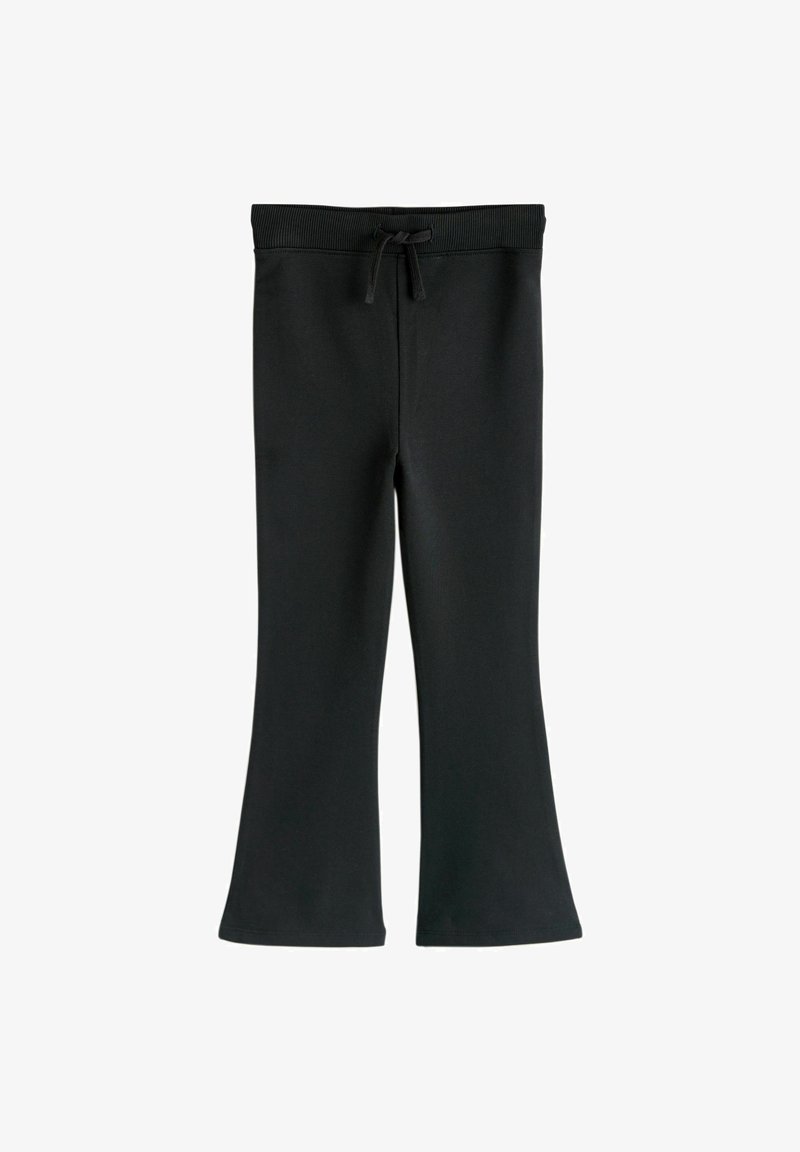 Pantalon de survêtement évasé noir en tissu extensible, doté d'une taille à cordon de serrage et d'une texture lisse, conçu pour le confort et la facilité.