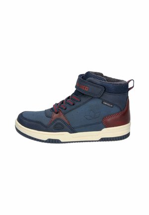Mid-top sneaker featuring a navy upper with brown leather accents, red detailing, textured mesh collar, and rubber outsole with patterned tread.