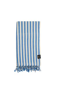 Blue and cream striped cotton towel with tassel fringe and a tag. Rectangular shape, lightweight, and textured fabric.
