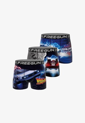 Trois paires de boxers avec ceintures "FREEGUN", présentant des designs Retour vers le Futur incluant la voiture DeLorean, des éclairs et le logo du film.