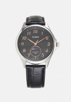 Karóra - black/brown