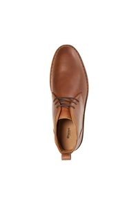 Brown leather ankle boot with rounded toe, featuring subtle stitching, minimalistic design, and a pull tab at the heel.
