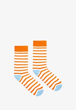 Pomarańczowe i białe skarpetki w paski z jasnoniebieskimi akcentami na palcach. Wykonane z miękkiego, elastycznego materiału w standardowej wysokości kostki.