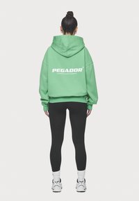 Pegador ATNA LOGO - Camisola - washed peppermint green/white