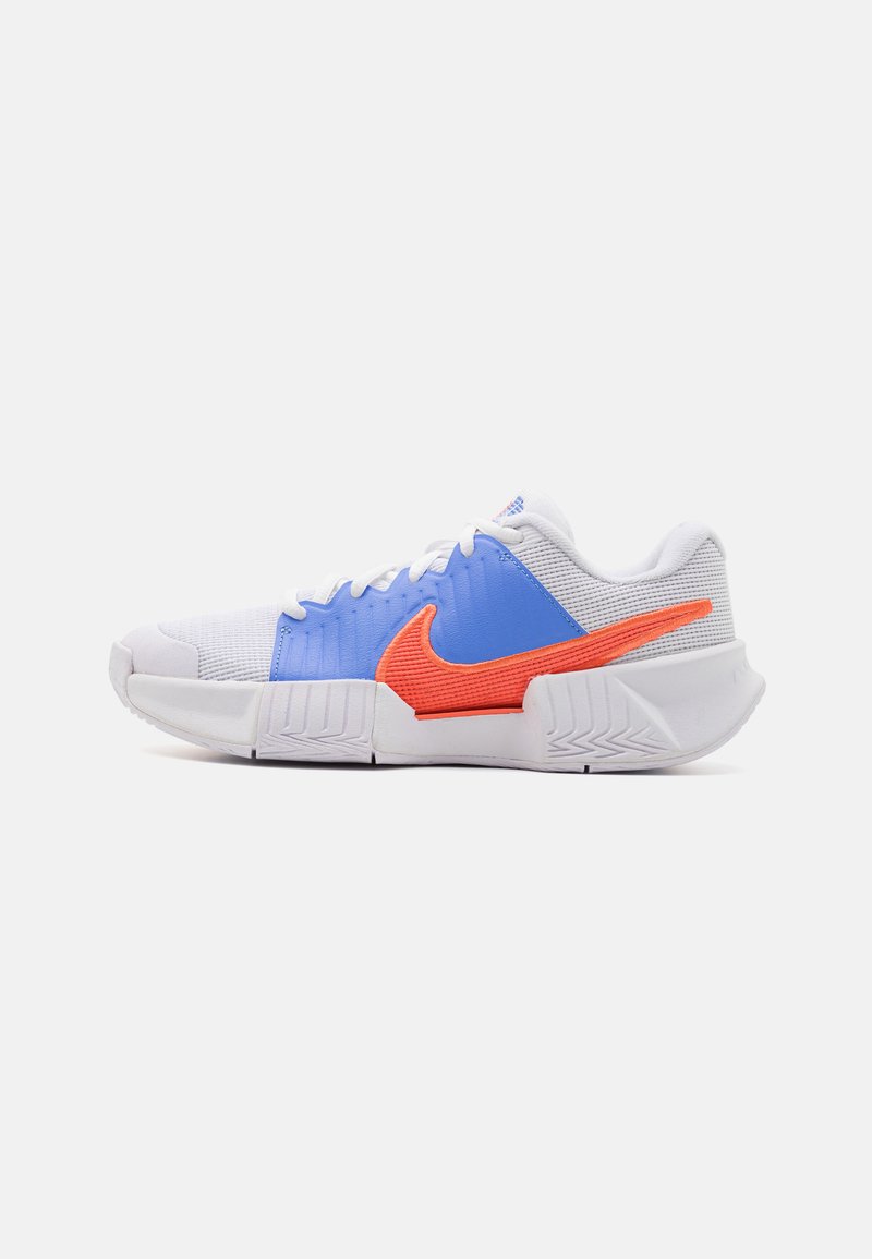 Nike sports shoes featuring a white mesh upper, blue accents, and a prominent orange swoosh. Textured detailing and a supportive sole.