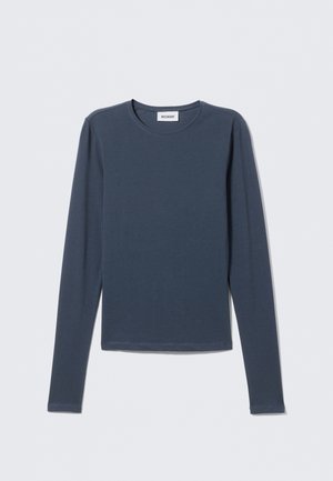 Long-sleeve shirt in navy blue, made of soft cotton. Features a round neckline and simple, basic design with no patterns or accents.