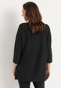 Cellbes of Sweden WITH STRUCTURE - Pitkähihainen paita - black