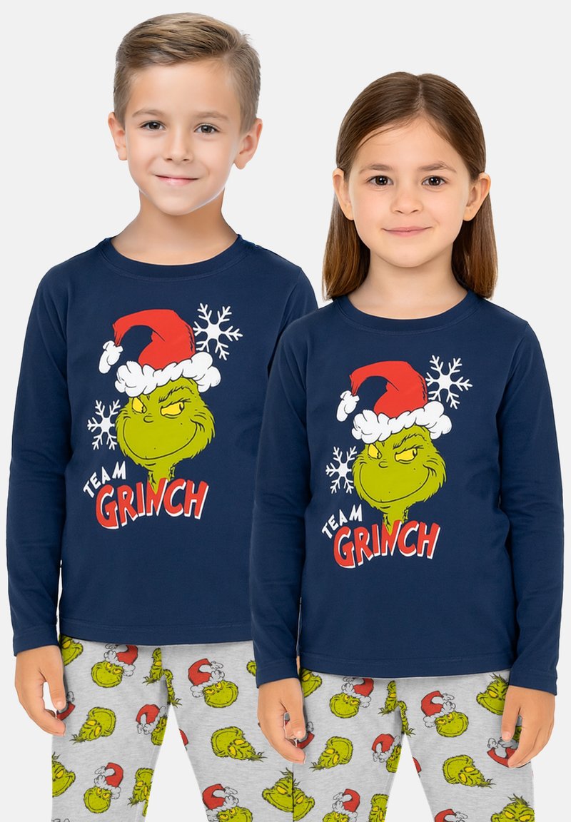 Le magliette a maniche lunghe della marina presentano un grafico del Grinch con un cappello rosso; pantaloni da pigiama grigi con motivo Grinch. Materiale in cotone.