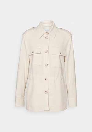 Cream-colored long-sleeve shirt jacket with front buttons, two buttoned chest pockets, and shoulder epaulets.