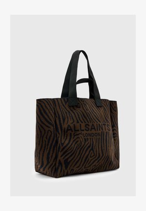 Hnedá a čierna taška cez rameno so vzorom zebry, čierne textilné rúčky a nápis "ALLSAINTS LONDON" vytlačený na prednej strane. Mäkka textúra.