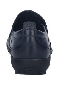 Black leather slip-on shoe with a rounded back, smooth texture, and minimal stitching details. Rubber sole for grip and stability.