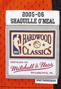 Orange mesh fabric features a stitched label with “2005-06 SHAQUILLE O'NEAL” above a multi-colored logo for “HARDWOOD CLASSICS” and brand details.