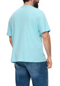  Lichtblauwe korte mouwen T-shirt van gebreide stof, met een relaxed fit. De achterkant toont een eenvoudig ontwerp zonder zichtbare patronen of accenten.