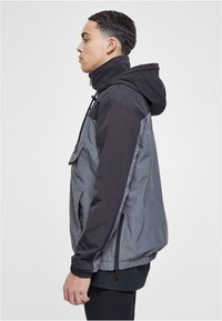 Karl Kani RETRO SPLIT  - Windbreaker - black