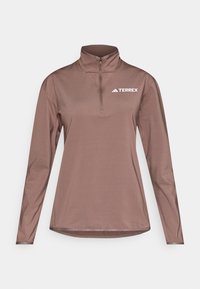 - Bluzka z długim rękawem