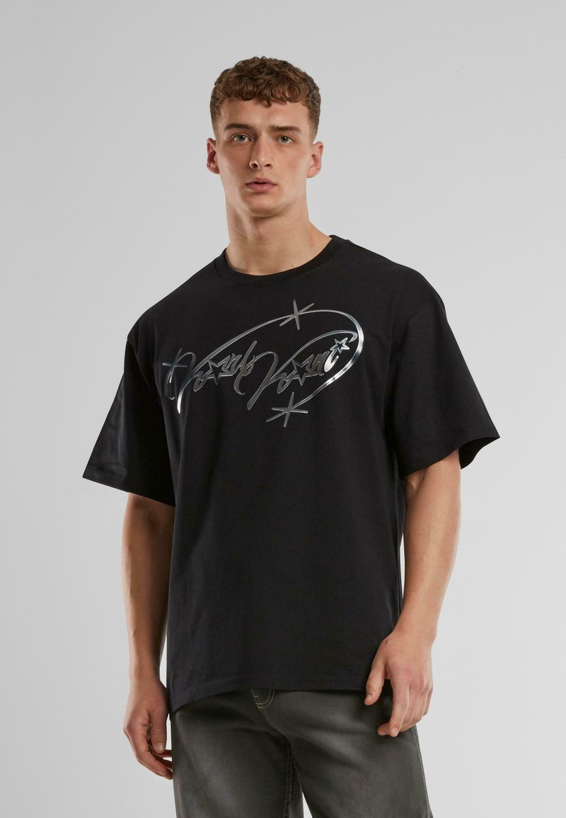 Black short-sleeve T-shirt made of cotton, featuring a silver graphic design on the front with a relaxed fit and round neckline.