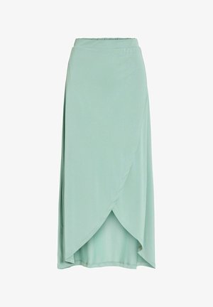 Šviesiai žalia midi sijonas su priekine užrišimo detale ir elastinga juosmens dalimi, pagamintas iš minkštos, lengvai krentančios medžiagos.