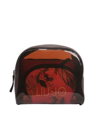 Borsa cosmetica trasparente con design floreale, base marrone e marchio dorato "LIU·JO". Presenta una chiusura con zip e forma arrotondata.