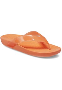 Pomarańczowe klapki z teksturowaną wkładką, błyszczącymi paskami i minimalistycznym designem. Wykonane z elastycznego materiału syntetycznego.