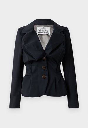 Marine blazer lavet af glat stof, med en peplum talje, store revers og tre brune knapper foran. Vivienne Westwood mærket er synligt.