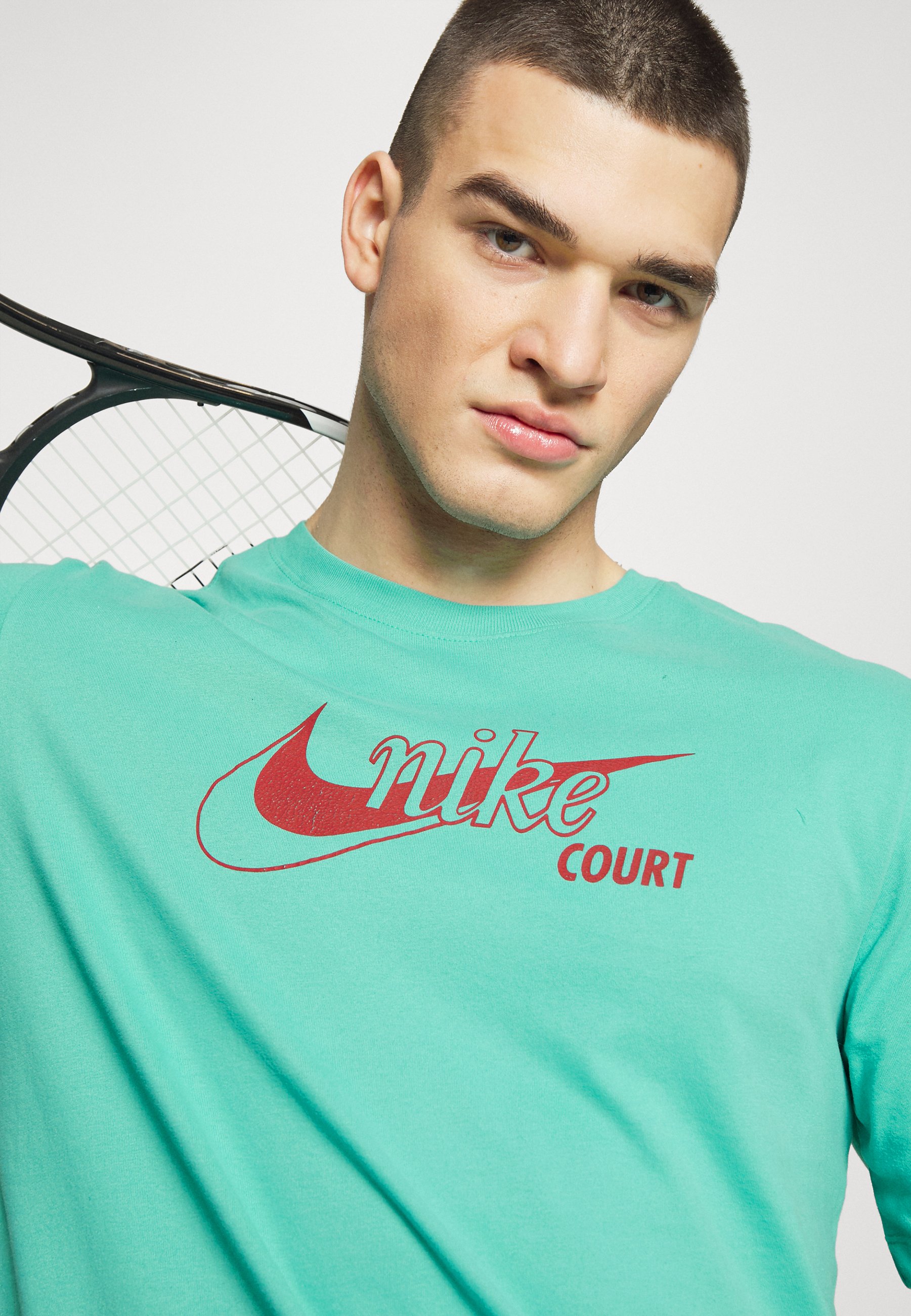 nike spirit teal shirt