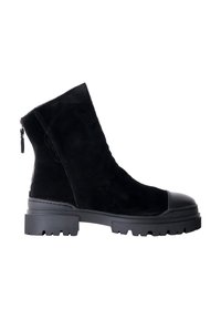 Stivaletti neri in suede con suola in gomma, punta tondae dettaglio con zip laterale. Presentano una suola spessa per una maggiore aderenza.