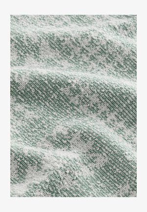 Tessuto in stoffa con un motivo testurizzato di fili bianchi e verdi, dall'aspetto intrecciato e con morbidi accenti in rilievo.